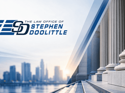 Modern law office branding graphic featuring courthouse columns, city skyline, and Stephen Doolittle law firm logo.