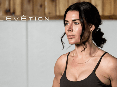 Woman in athletic wear representing Elevétion Health’s focus on personalized, data-driven wellness and longevity optimization.