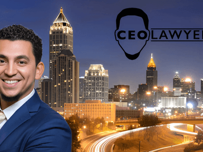 Smiling man in a blue suit stands in front of Atlanta skyline with "CEO Lawyer" logo in background.
