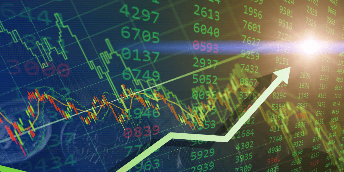 Financial chart with rising trend lines and stock prices on a digital display