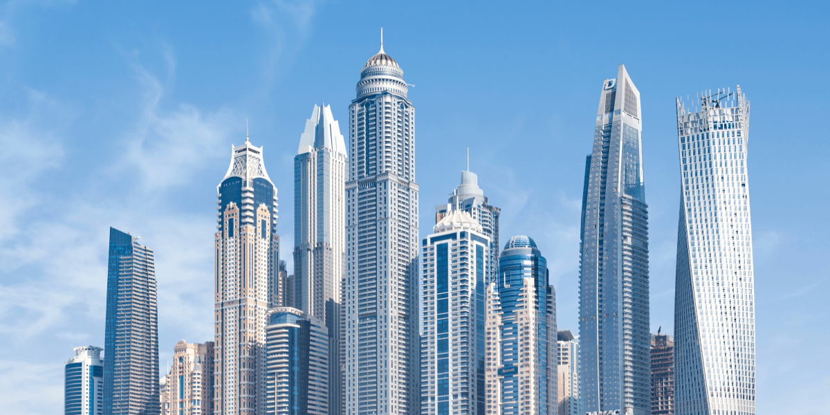 Skyline of modern skyscrapers against a clear blue sky