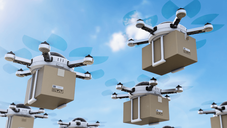 A fleet of delivery drones carrying brown packages soaring against a blue sky