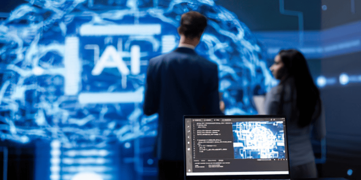 Two people observe a digital display of AI data and brain visualizations.