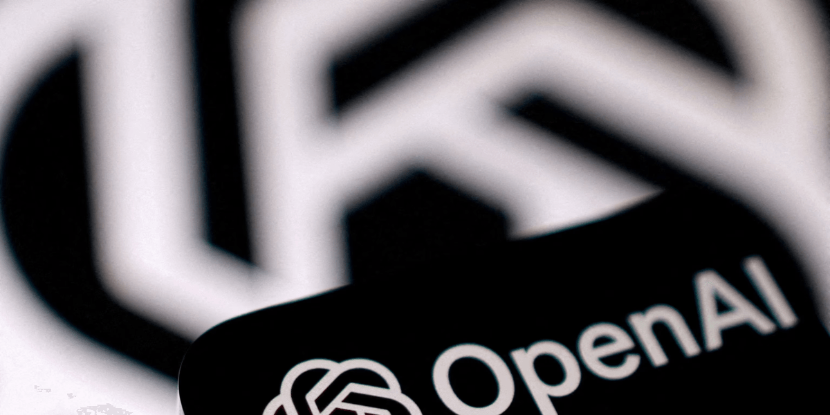 Close-up of the OpenAI logo with a blurred geometric background
