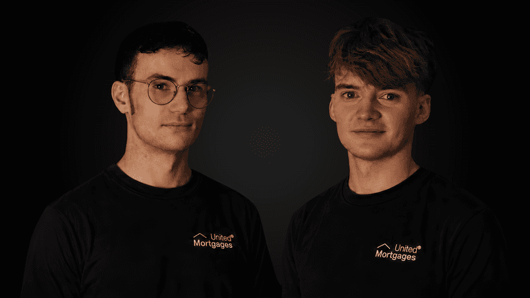 Two young men wearing black shirts with "United Mortgages" logo against a dark background