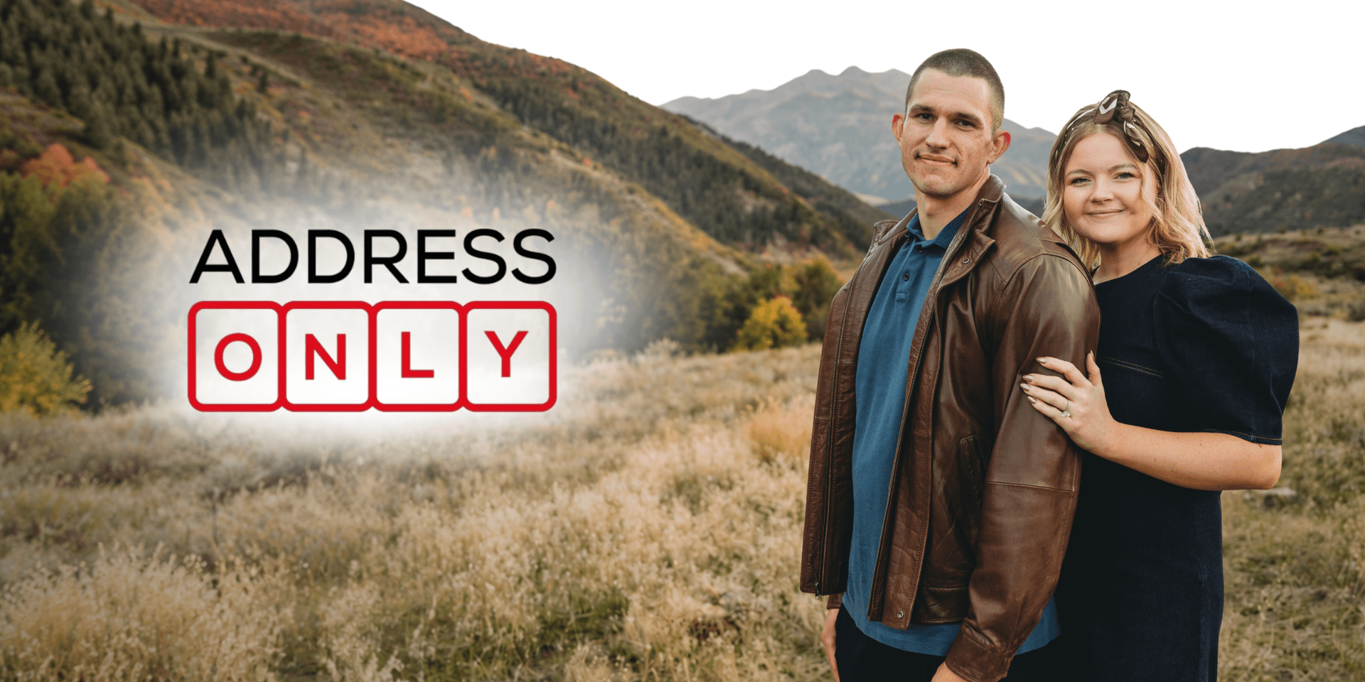 A couple stands together in a scenic mountain landscape with text overlay "ADDRESS ONLY"