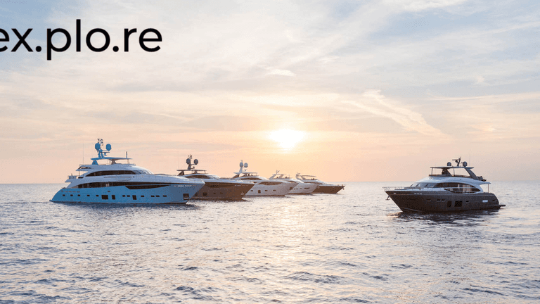 Luxury yachts at sunset representing premium brokerage networking and exclusive client experiences.