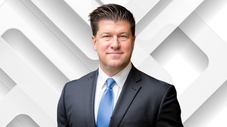 Scott DeSalvo, Illinois' Best Personal Injury Lawyer 2025, standing confidently in a suit, committed to justice and clients.