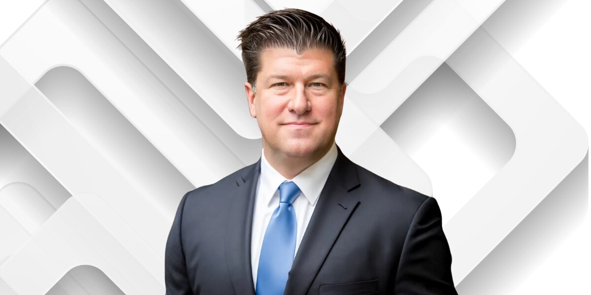 Scott DeSalvo, Illinois' Best Personal Injury Lawyer 2025, standing confidently in a suit, committed to justice and clients.