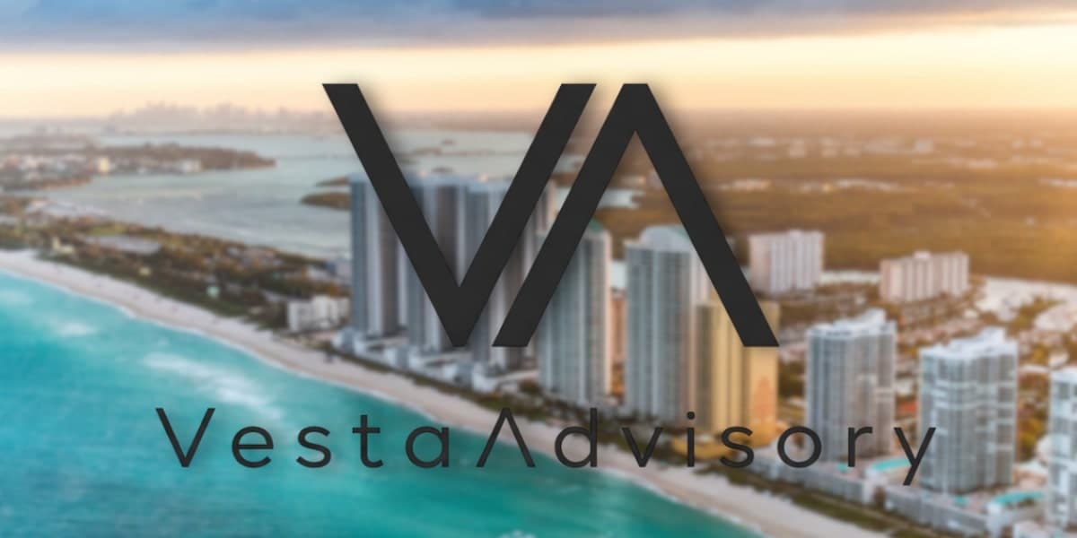 Vesta Advisory logo over a blurred cityscape, representing Lena Glavinovitch’s strategic vision in hospitality real estate.