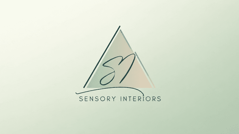 Sensory Interiors logo featuring a minimalist triangle and stylized initials on a light background.